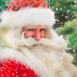 Santa Claus portrait smiling against christmas tree outdoor in s