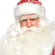 Santa Claus portrait smiling isolated over a white background an