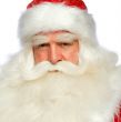 Santa Claus portrait smiling isolated over a white background