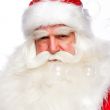 Santa Claus portrait smiling isolated over a white background an