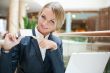 Portrait of a pretty businesswoman sitting at cafe with a laptop
