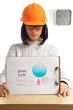 Young architect-woman wearing a protective helmet