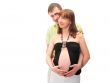 Image of pregnant woman touching her belly with hands
