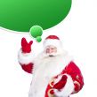 Santa Claus pointing his hand isolated over white. Blank graphic