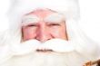 Santa Claus portrait smiling isolated over a white background
