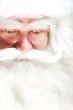 Santa Claus portrait smiling isolated over a white background