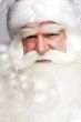 Santa Claus portrait smiling isolated over a white background an