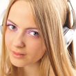 Beautiful woman with headphones, she is listening to the music