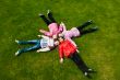 Image of funny kids playing on the grass