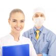 Portrait of Smiling doctor with his colleague in front of the ca