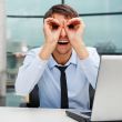 Closeup portrait of businessman looking for employees. Sitting i