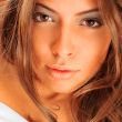 Fashion portrait of young elegant woman in bed