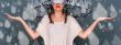 Portrait of beautiful young fashionable woman standing under umb