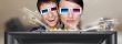 Portrait of young stylish modern couple wearing 3d glasses watch