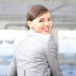 A portrait of a young business woman in an office