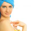 Beautiful young woman after shower with towel on her head