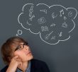 Image of young man thinking of his plans. Lots of copyspace insi