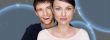 Portrait of beautiful futuristic style couple looking at camera 