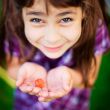 Artistic lifestyle photo of cute little girl outdoor at summer p