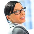 Closeup portrait of cute young business woman smiling