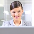 Beautiful business woman thinking about somethinking while worki