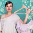 Portrait of pretty fashionable woman trying new clothes. Fashion