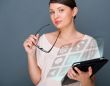 Portrait of young pretty woman holding tablet computer and glass