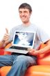 Young man holding his laptop