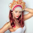 Closeup portrait of pretty young woman with red hairs