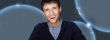 Portrait of handsome futuristic style man looking at camera agai