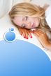 Portrait of young beautiful sleeping woman on bed at bedroom