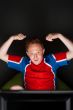 Closeup portrait of young man wearing sportswear fan of football