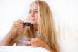 Closeup portrait of a pretty young female having a cup of coffee