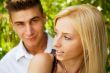 Closeup portrait of smiling young couple in love - Outdoors