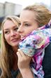 Two women talking