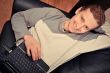 Happy young man  sitting on sofa at home