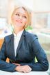 Closeup portrait of cute young business woman smiling