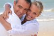 Couple hugging on the beach