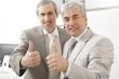 Portrait of two businessmen who approve.