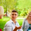 Portrait of three young teenagers laughing and having fun togeth