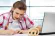 Portrait of handsome young man working with laptop on freelance 