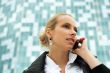 Portrait of pretty beautiful business woman on the phone with a 