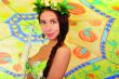 Portrait of young woman with beach umbrella 