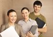 Portrait of three office workers.