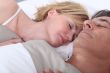 Husband and wife sleeping