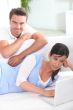 Couple sat in living-room