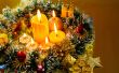 Christmas carol and burning candles