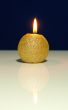 Golden burning candle
