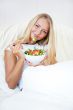 Closeup portrait of a beautiful slender girl eating healthy food
