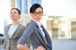 Portrait of a beautiful business woman with a female colleague